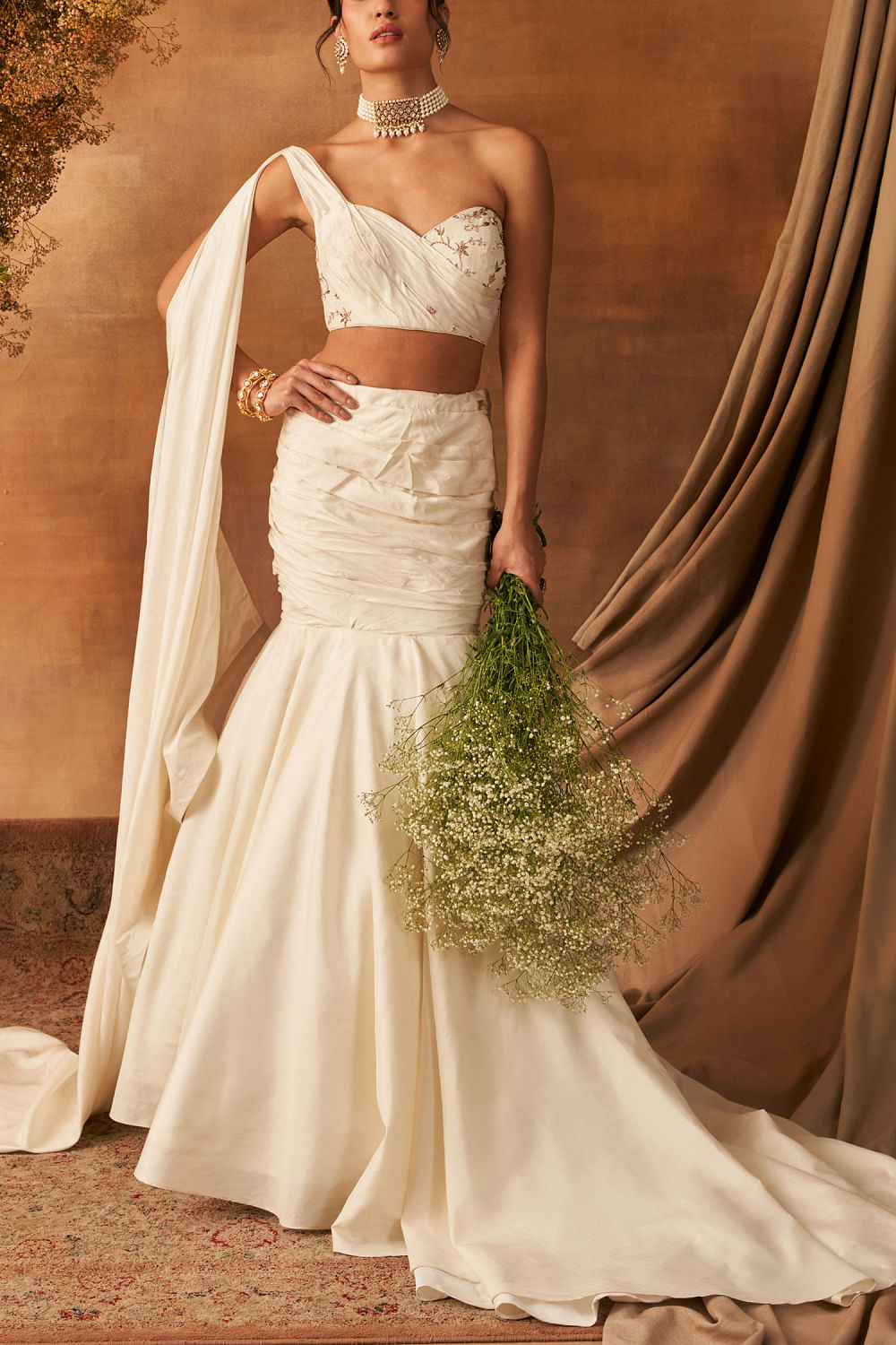 Ivory draped fishtail lehenga set