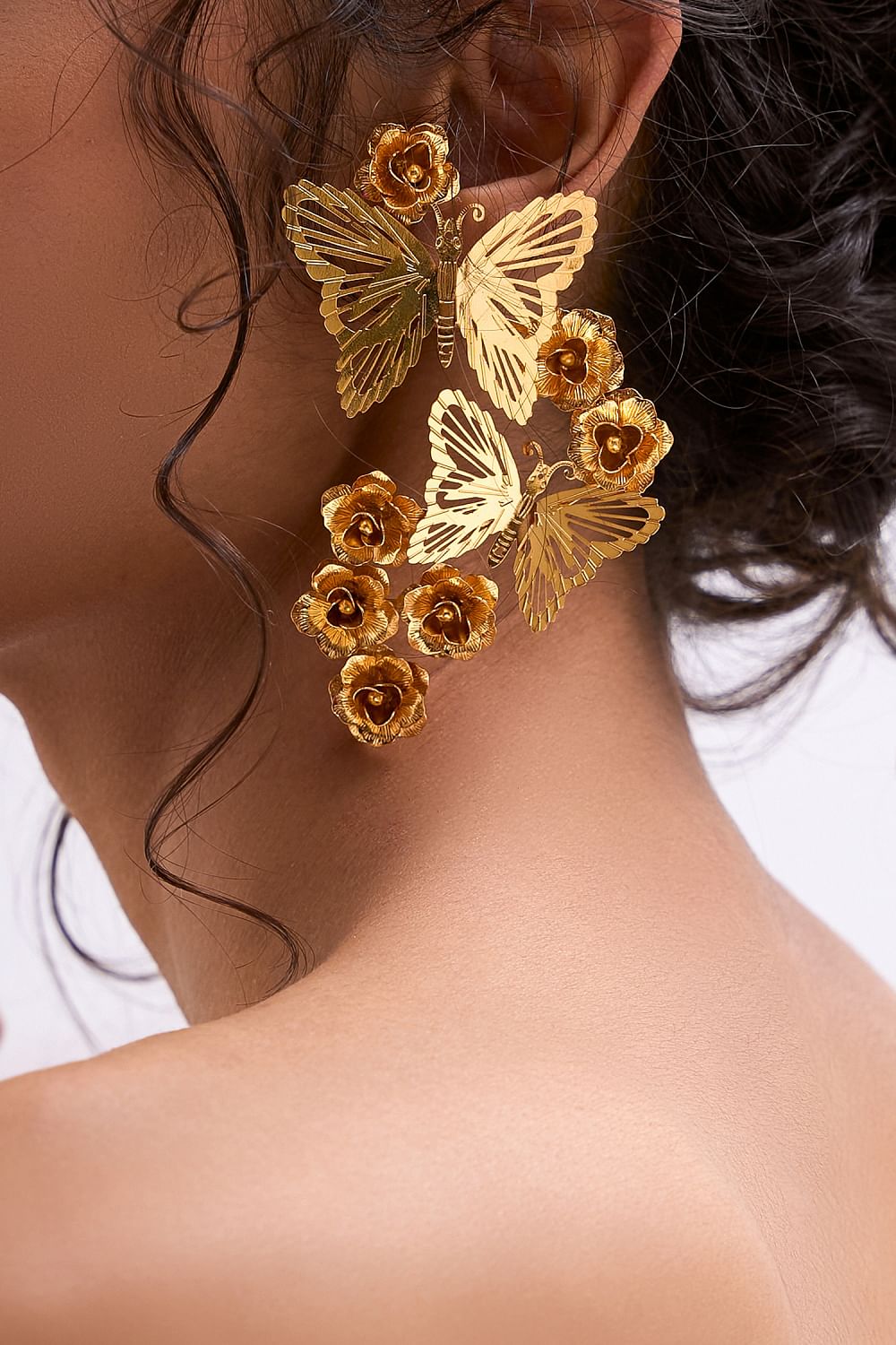 Buy Gold butterfly earrings by Ruhhette at Aashni and Co