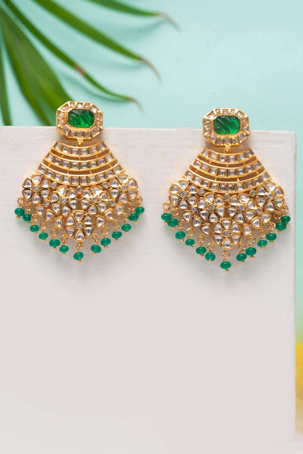 Buy Gold green kundan earrings by Zevar By Geeta at Aashni and Co