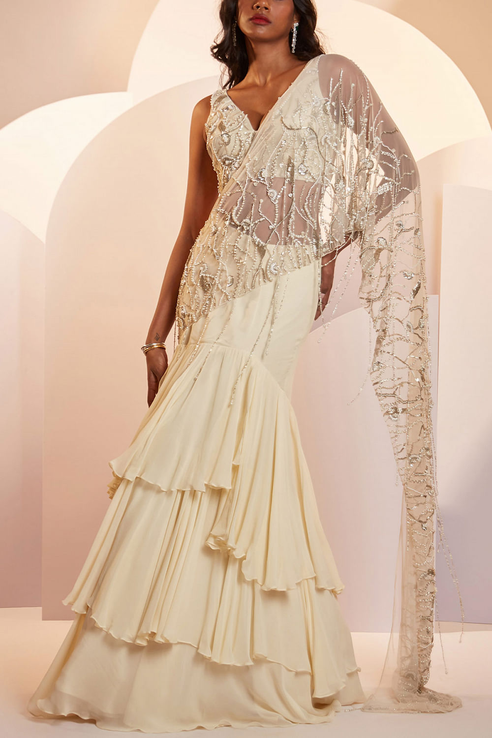 Buy Ivory layered skirt sari set by Shloka Khialani at Aashni and Co