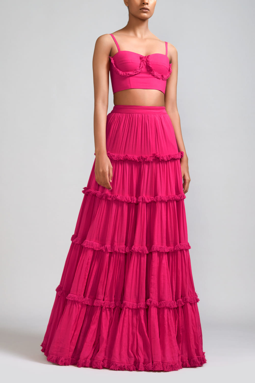 Buy Pink fringe detailed tiered skirt by Mati at Aashni and Co 