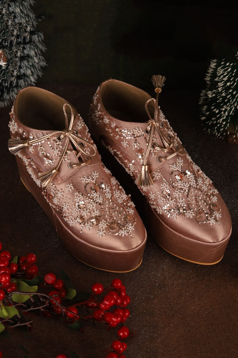 Buy Rose gold pearl bead work sneaker wedges by Tiesta at Aashni