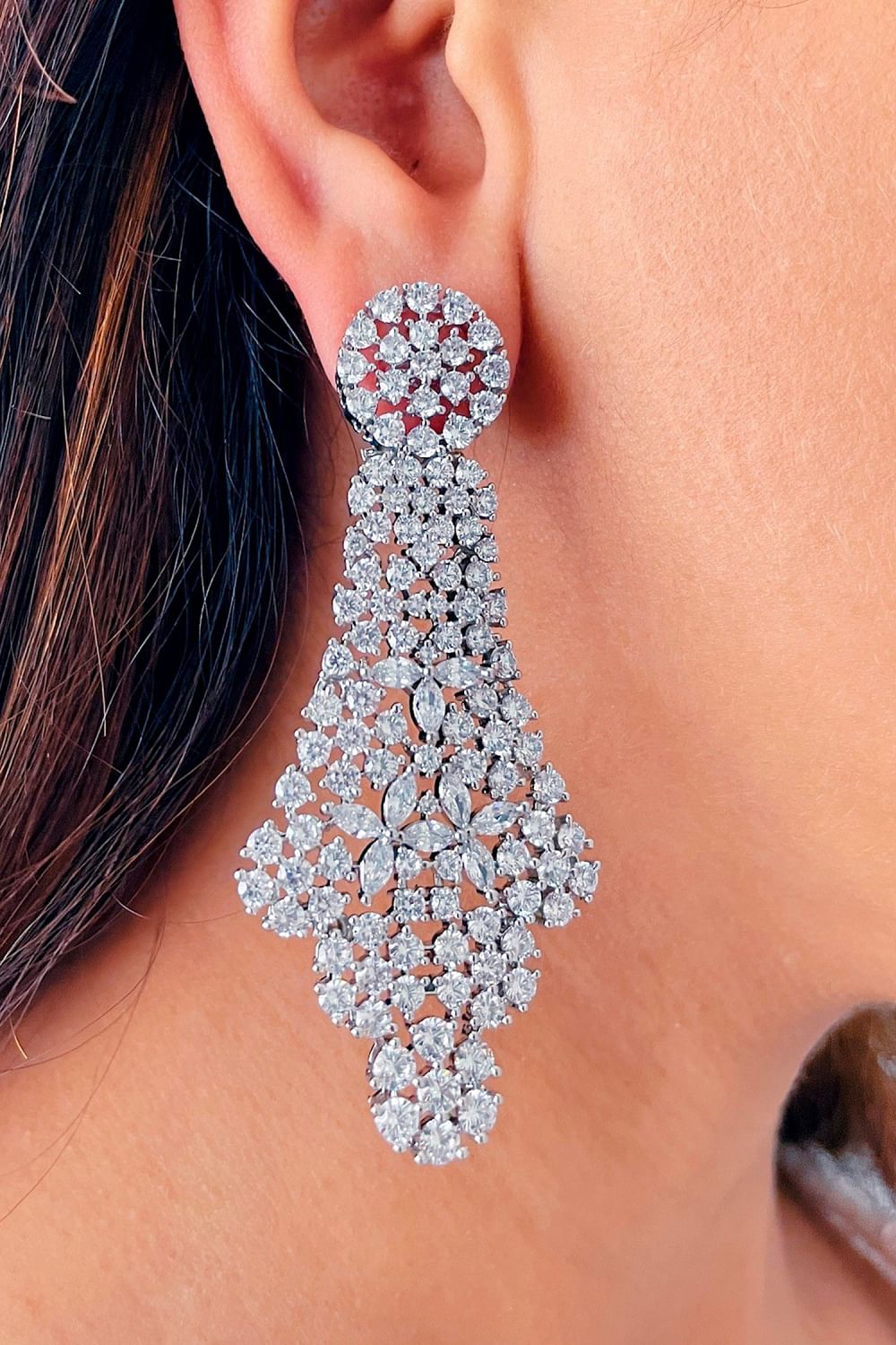 Buy Silver floral Swarovski danglers by Prerto at Aashni and Co