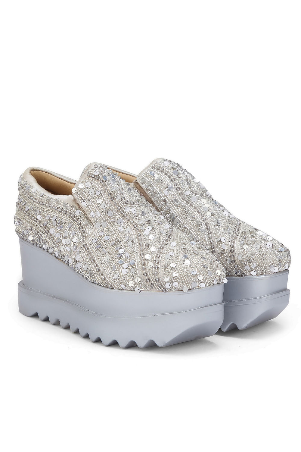 Buy Silver wavy sequin embellished wedge sneakers by Anaar at Aashni and Co