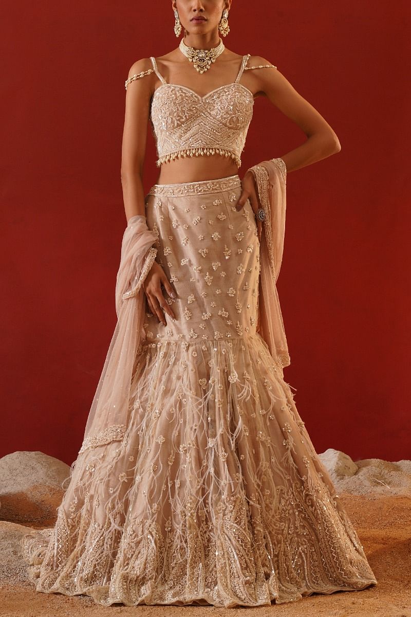 Buy Beige hand embroidered mermaid lehenga set by Kapda Dori at Aashni and Co