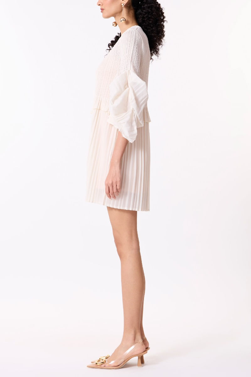 Buy Ivory pleated mini dress by Scarlet Sage at Aashni and Co