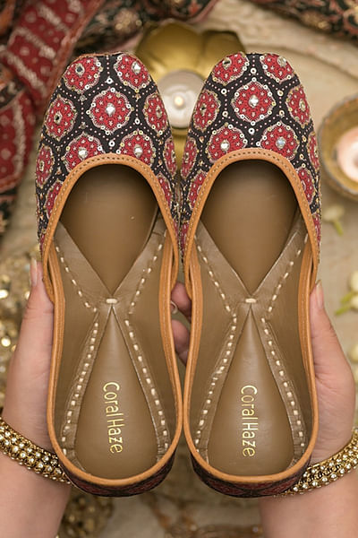 Black ajrakh print and embroidered juttis