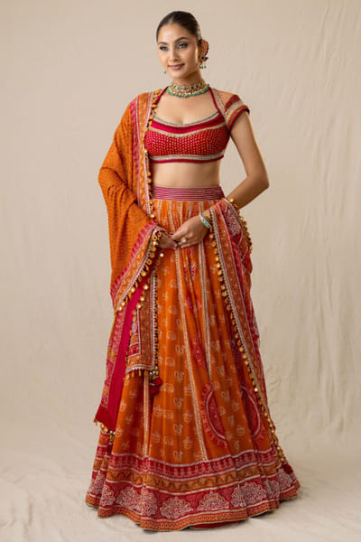 JIVIVA BY Jigvijay & Varsha Orange and red bandhej lehenga set JIVIJUN26D147869