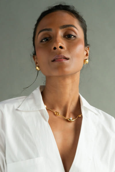 Gold moon textured stud earrings