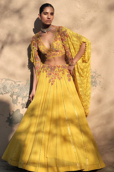 Yellow dori embroidered cape and lehenga set