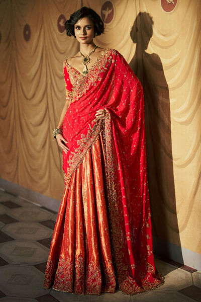 Red and saffron embroidered sari set
