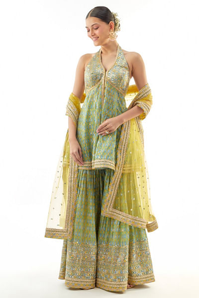 Yellow printed halter-neck peplum sharara set