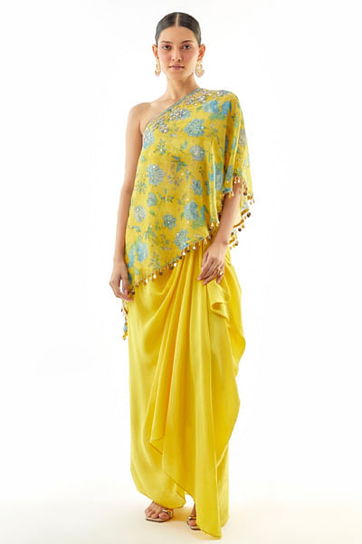 Yellow one-shoulder top and drape skirt set