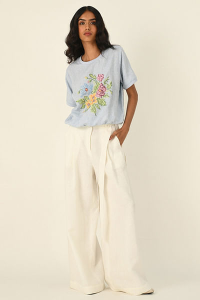 Blue floral cross-stitch embroidered top