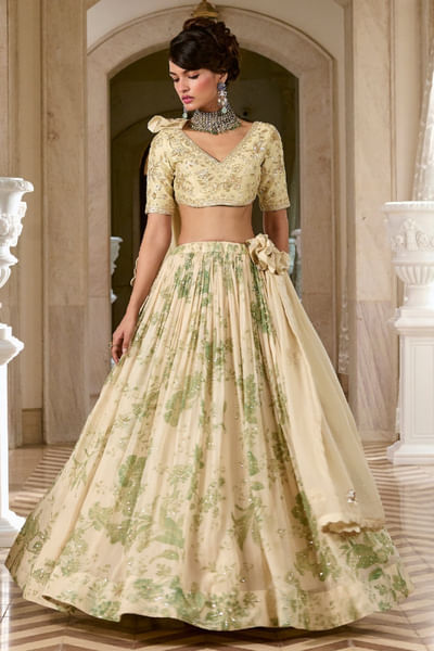 Ivory and green embroidered lehenga set