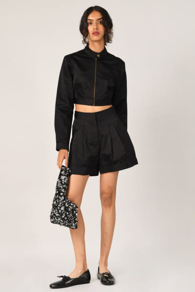 Black pleated satin shorts