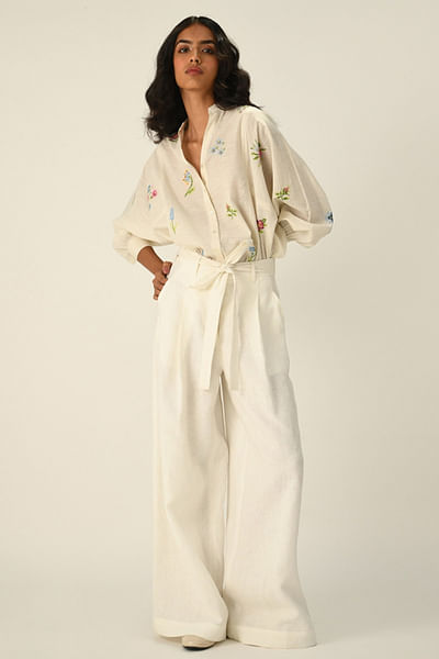 Ivory pleated and belted wide-leg pants