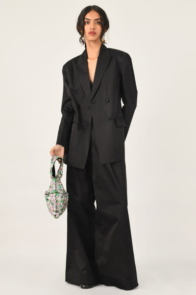 Black pleated trousers