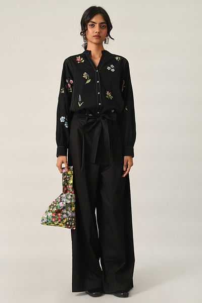 Black pleated and belted wide-leg pants