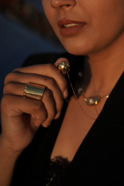 Gold moon-textured pendant necklace