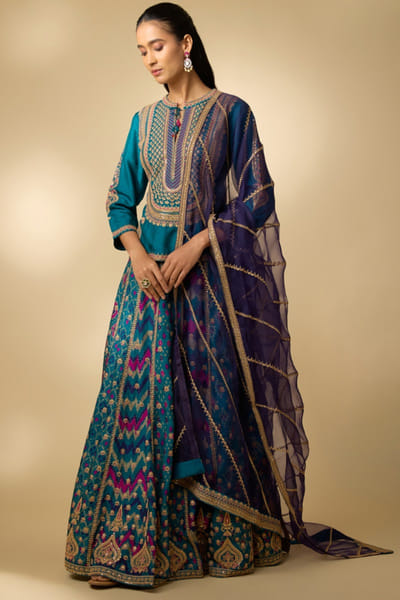 Shraddha Rambia Teal embroidered patola print lehenga set SHRAMAY26D144602