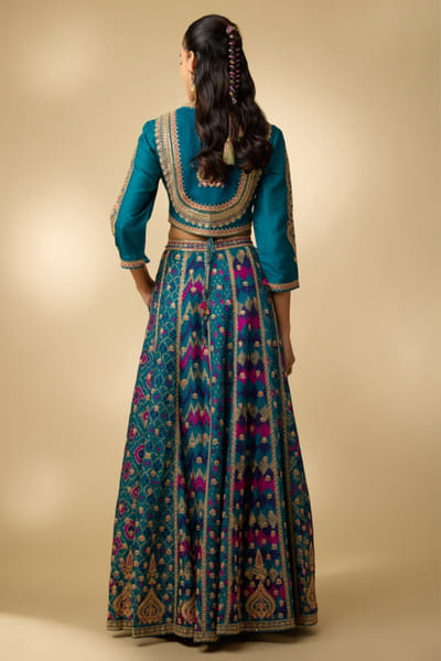 Shraddha Rambia Teal embroidered patola print lehenga set SHRAMAY26D144602