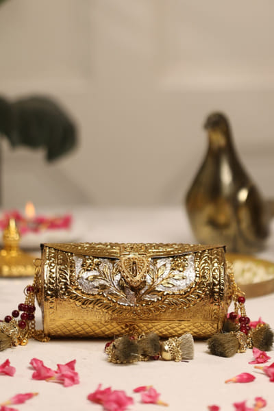5 Elements by Radhika Gupta Gold embellished metal clutch 5ELEJUN26D148323