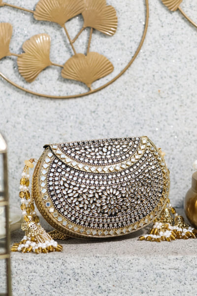 5 Elements by Radhika Gupta Gold mirror embellished metal bag 5ELEJUN26D148325