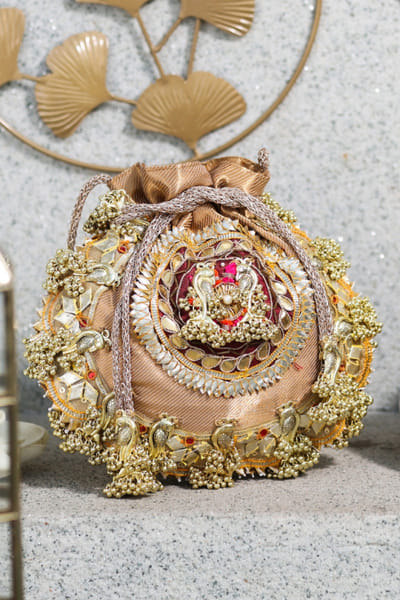5 Elements by Radhika Gupta Gold embellished brocade potli bag 5ELEJUN26D148326