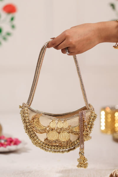 5 Elements by Radhika Gupta Gold coin-tassel embellished handbag 5ELEJUN26D148328