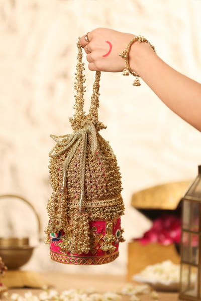 5 Elements by Radhika Gupta Pink peacock zari-bead embellished potli bag 5ELEJUN26D148340