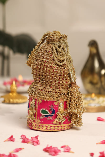 5 Elements by Radhika Gupta Pink peacock zari-bead embellished potli bag 5ELEJUN26D148340