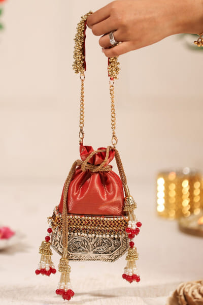 5 Elements by Radhika Gupta Red embellished brocade potli 5ELEJUN26D148350
