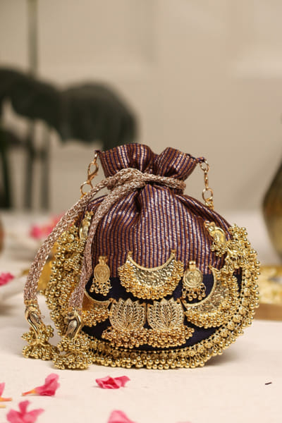 5 Elements by Radhika Gupta Black lotus-ghungroo embellished potli 5ELEJUN26D148351