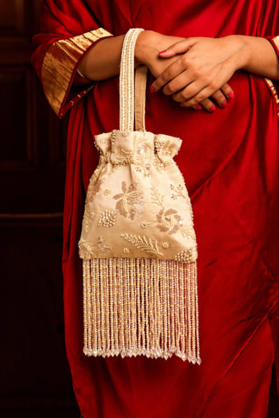 Off white floral embroidered potli bag