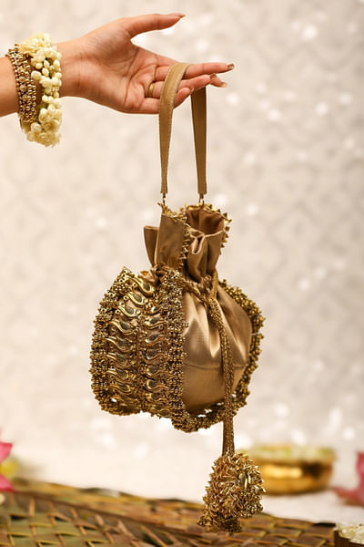Gold ghungroo detail brocade potli bag