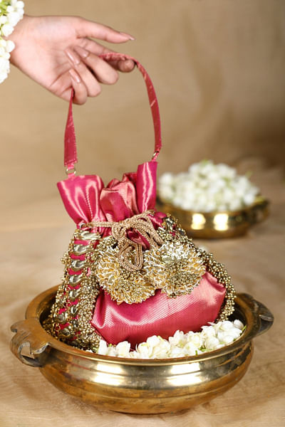 Pink bird ghungroo detail brocade potli bag