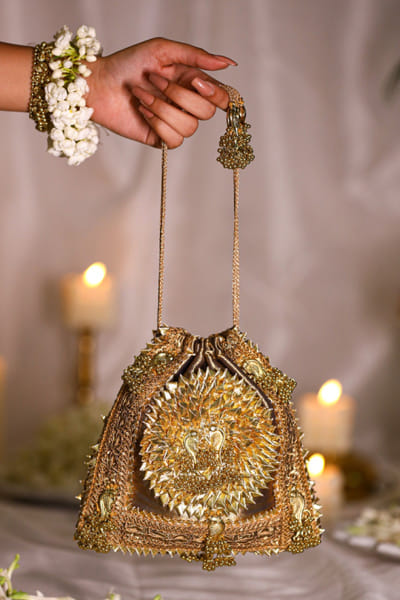 Gold bird ghungroo detail bucket bag