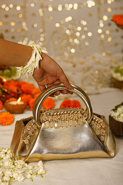 Gold kundan and pearl handbag