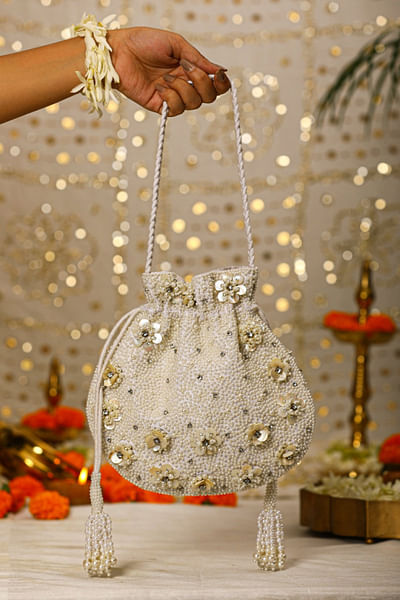 White floral pearl and stone potli bag
