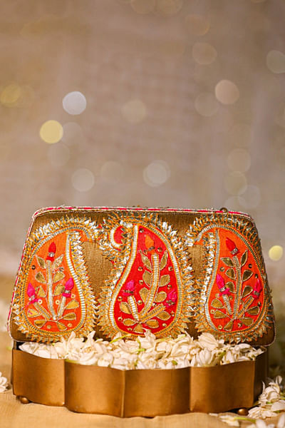Gold and orange paisley gota embroidery clutch