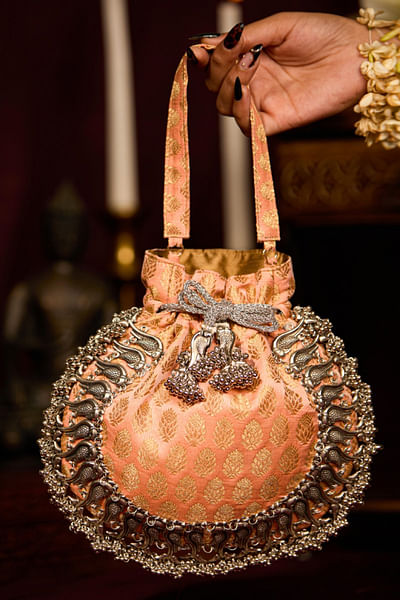 Peach peacock-beaded and tasselled potli bag
