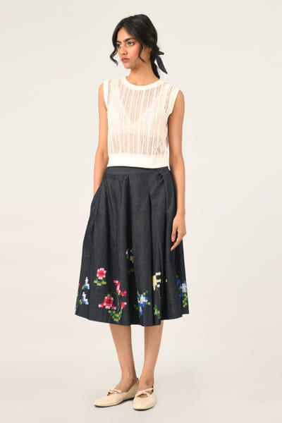 Blue embroidered and pleated denim skirt