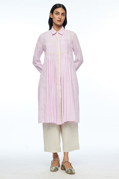 Pink smocked and collared tunic