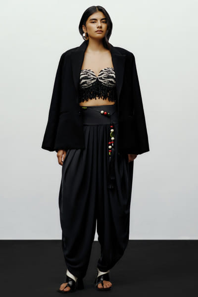 Black draped tapered pants