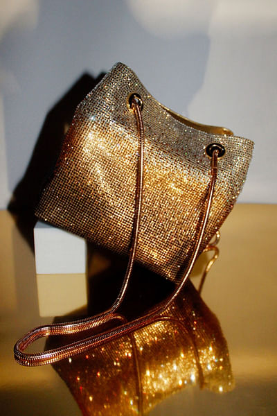 Gold diamond crystal embellished potli bag