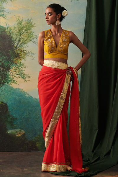 Yellow cutdana embroidered blouse