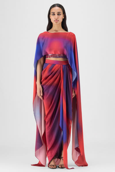 Red and blue pleated cape-draped skirt set