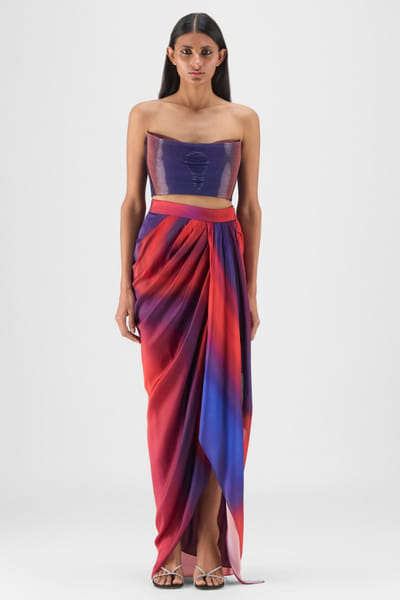 Blue pleated bustier and draped skirt set