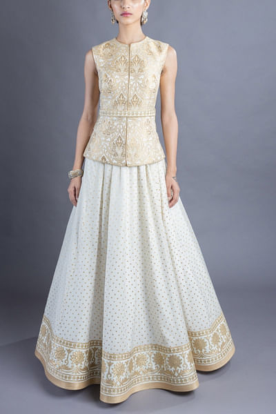 Cream lehenga and waistcoat